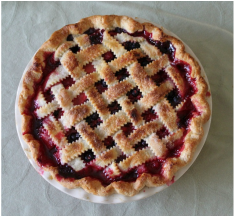 A whole cherry pie, dripping with juice and history